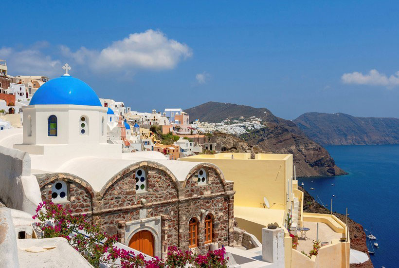 Sun-drenched Santorini awaits visitors to the Greek islands